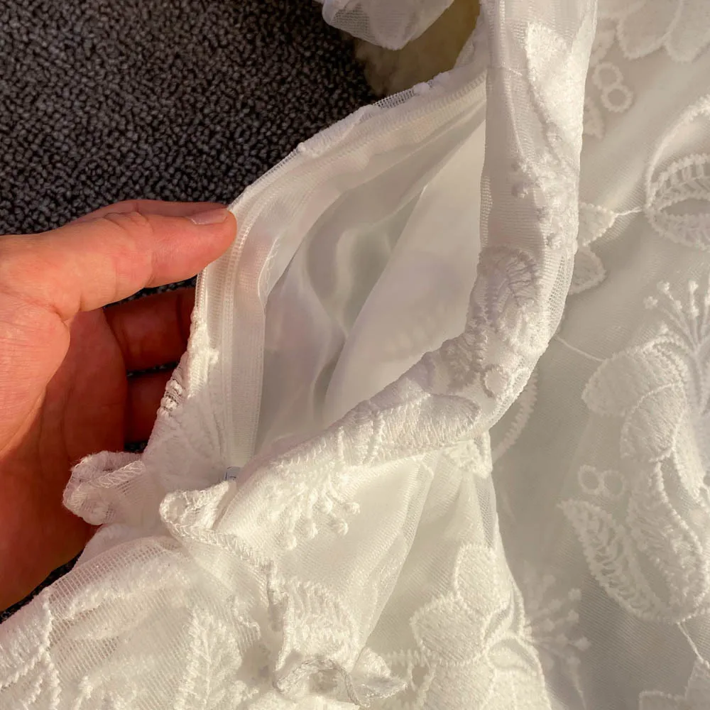 Féminité robe dentelle blanche